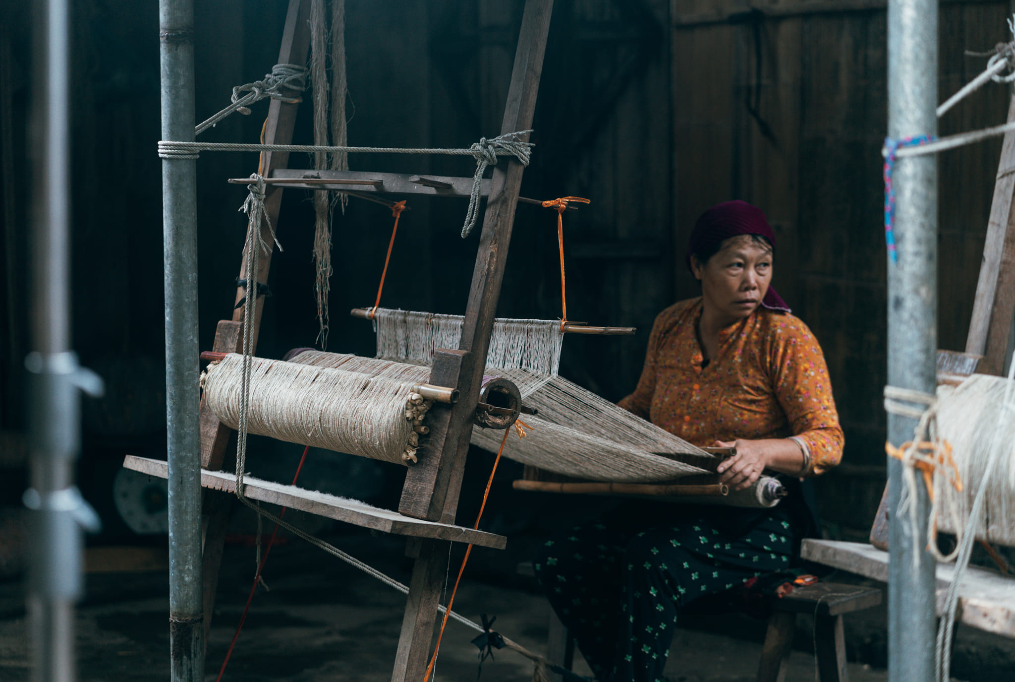Visit Lung Tam Weaving Village and watch local women handcraft colorful hemp textiles