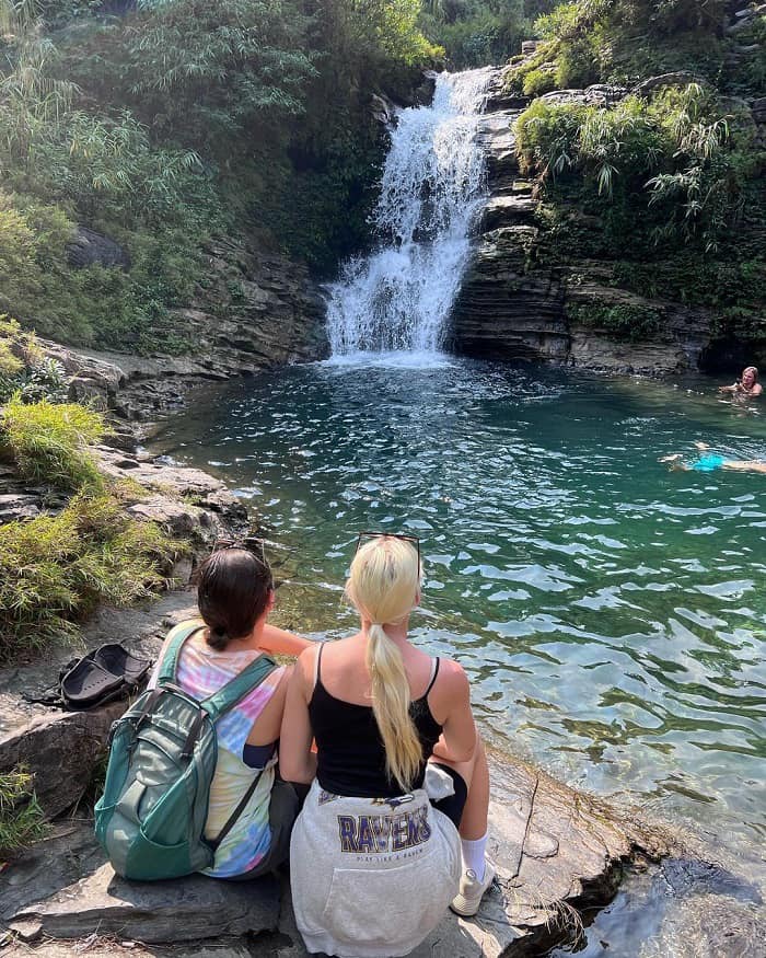 Stroll through Du Gia Village and swim in the refreshing Du Gia Waterfall