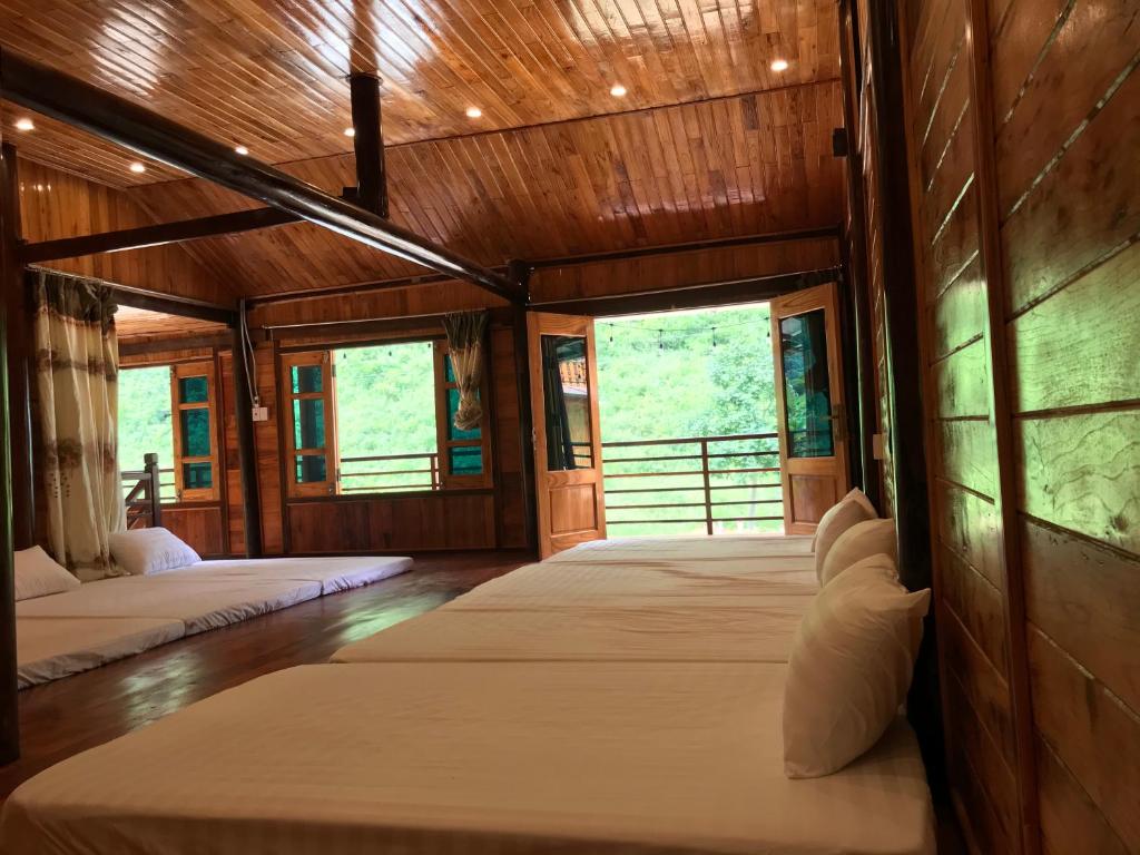 Stay overnight at Tay ethnic village in Pac Bo