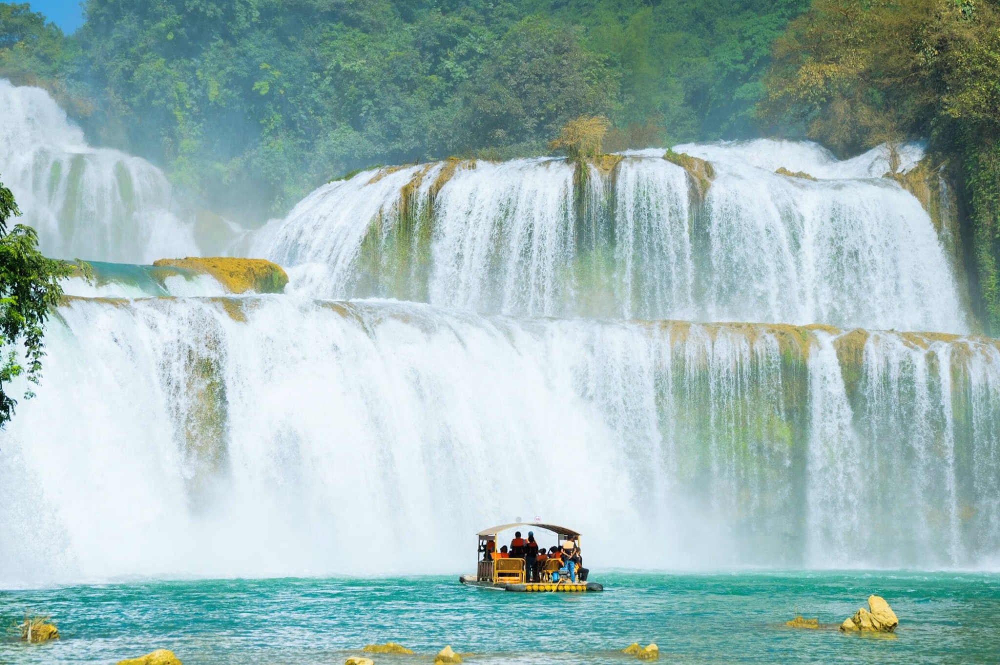 Visit the magnificent Ban Gioc Waterfall, one of the most beautiful waterfalls in Asia - Take a boat ride close to the falls, then relax at a local homestay.